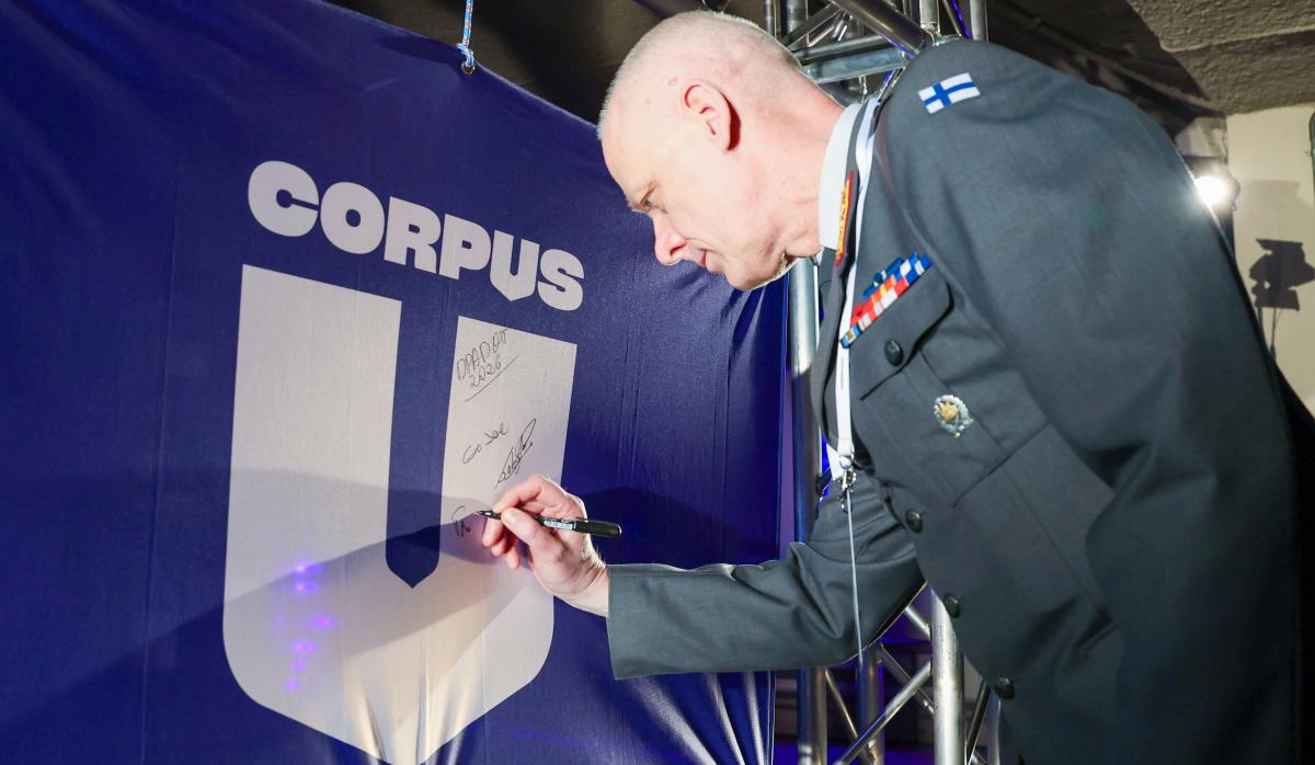 In the photo, Major General Tero Ylitalo, Director of the Defence Forces Logistics Command, signs his name on the CORPUS banner