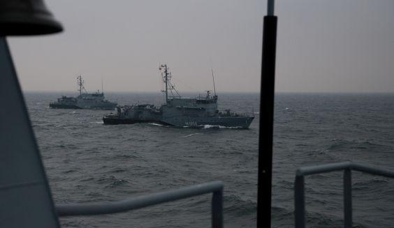 Two German Mine Hunters at sea, seen from the Minelayer.