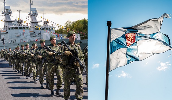 Marssiva joukko ja Suomenlippu kuvituskuvassa.